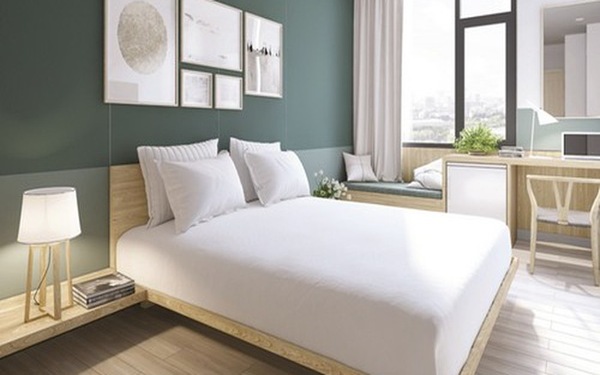 Phòng ngủ khách sạn mini trang nhã với gam màu trắng tinh khôi 