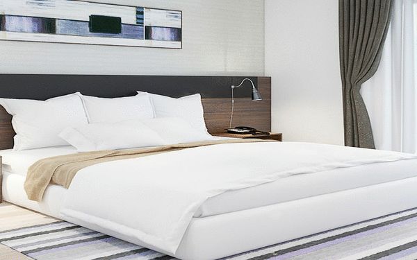 Drap bọc giường trằng với thiết kế đơn giản, đẹp tinh tế