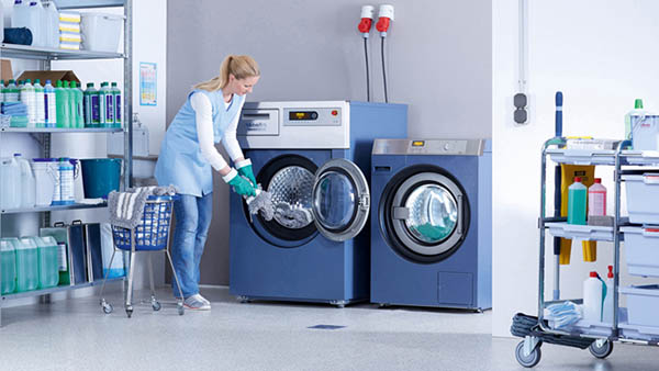 vệ sinh máy giặt công nghiệp